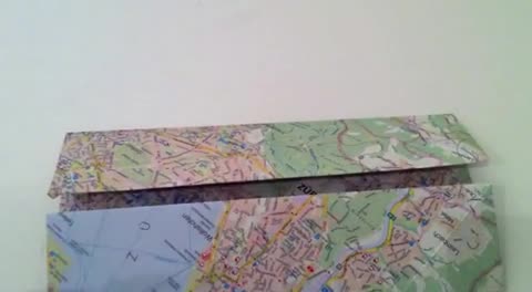 Geschenkschachtel basteln aus Landkarte